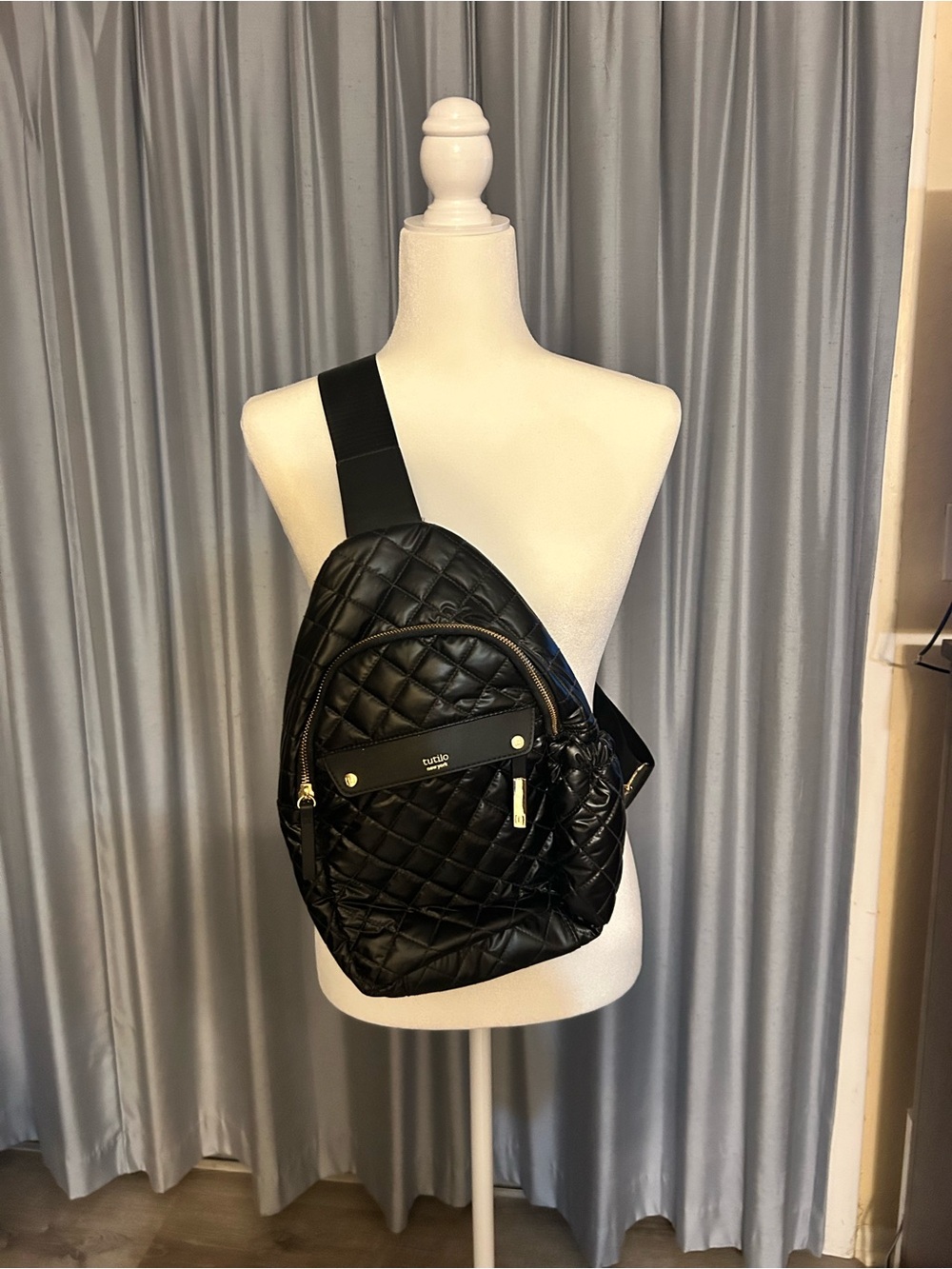 Tutilo Black Quilted Sling Backpack